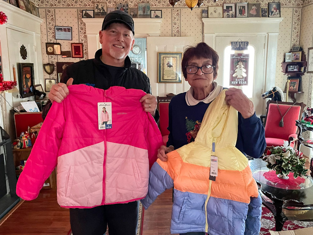 Maine Water team shows off coat donations